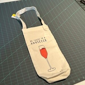 Saks 5th canvas wine gift bag. Be there in Prosecco. Cute!